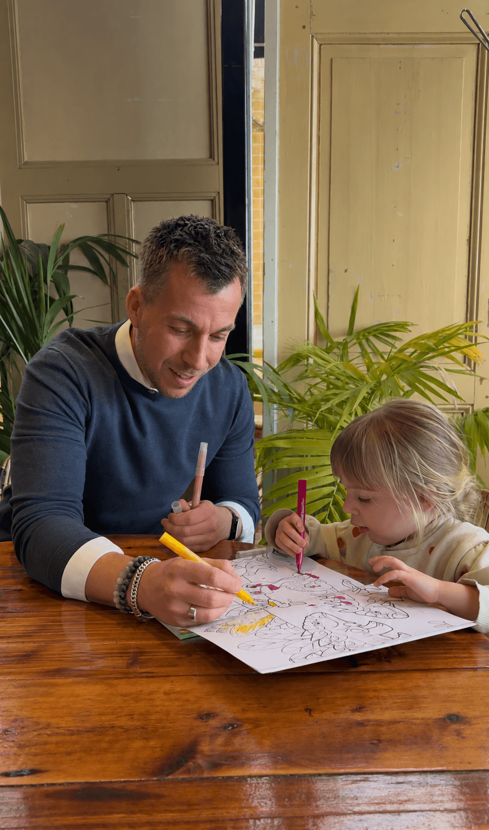 Bas spending time drawing with his daughter